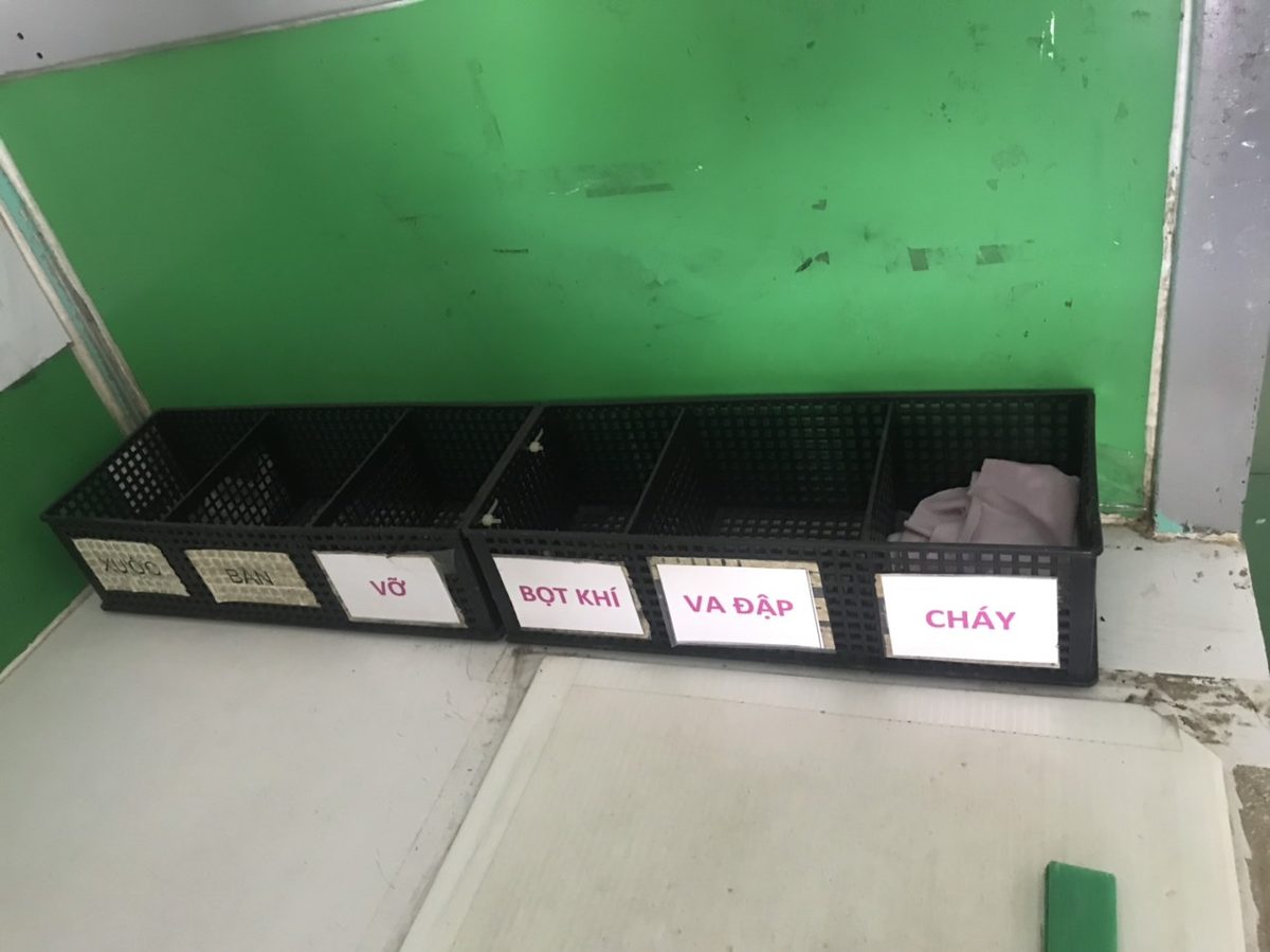 Hirata finished parts in labeled storage baskets